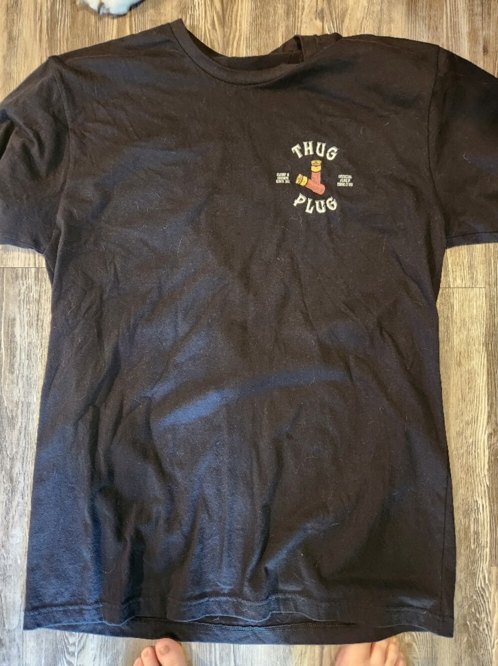Black Graphic Tee with Small Colorful Logo